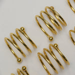 Load image into Gallery viewer, Gold Orb Spiral Napkin Rings