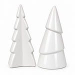 Load image into Gallery viewer, Two white ceramic Christmas tree-shaped ornaments on a wooden desk with papers and a lamp in the background.