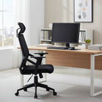 Load image into Gallery viewer, Black office chair with mesh backrest on a white background