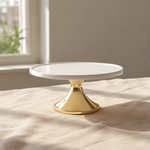 Load image into Gallery viewer, White Gold Cake Stand displayed on a complementary linen tablecloth