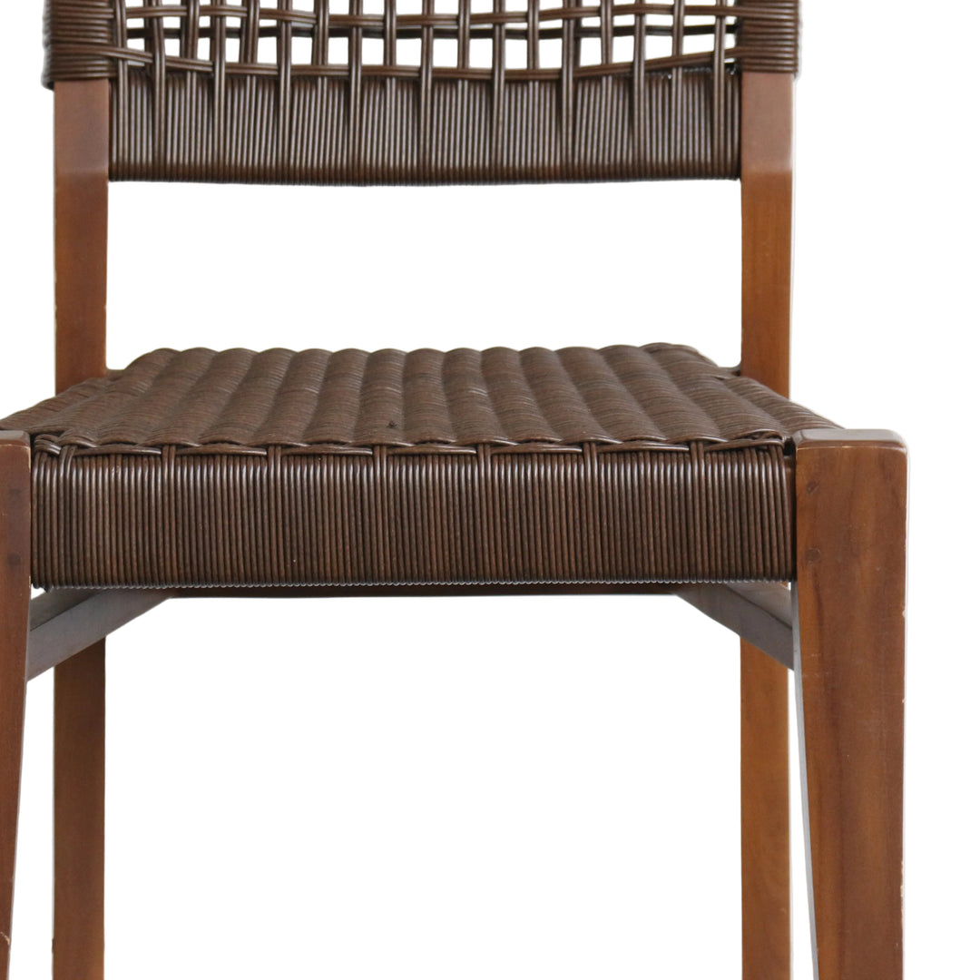 Wooden chair with woven seat and backrest on a white background