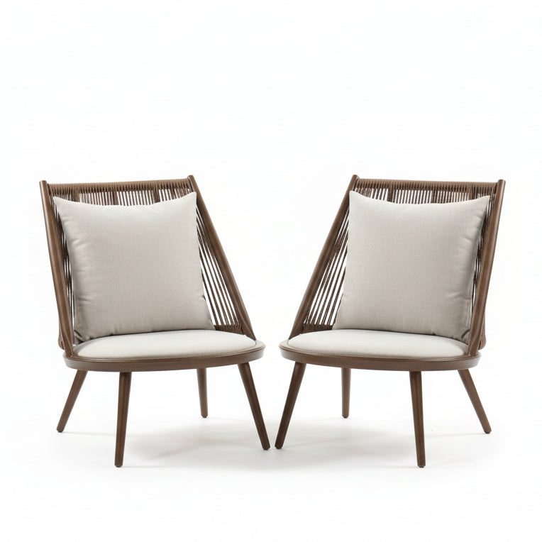 Two wooden chairs with white cushions in a room setting.