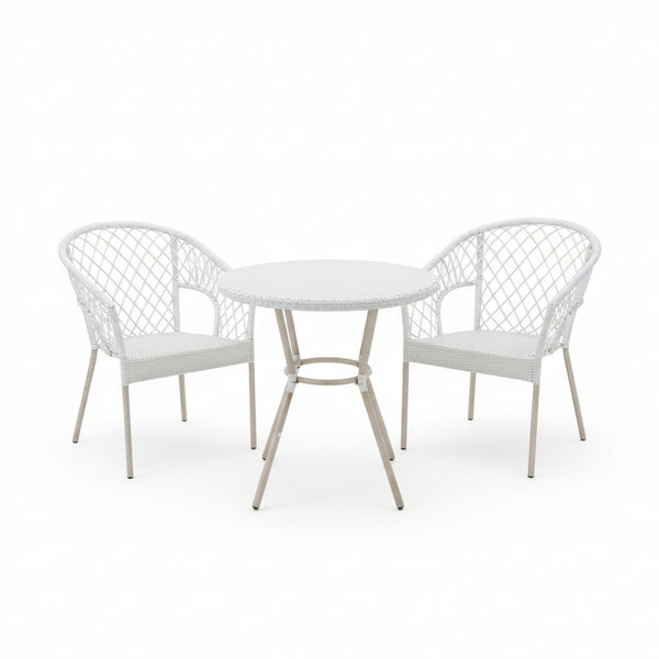 White round table with two matching chairs on a tiled patio