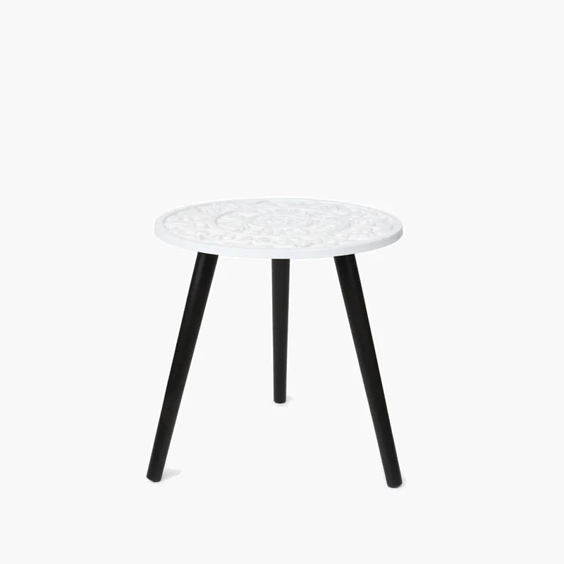 Floral Relief Accent Table on #f8f8f8, white details preserved