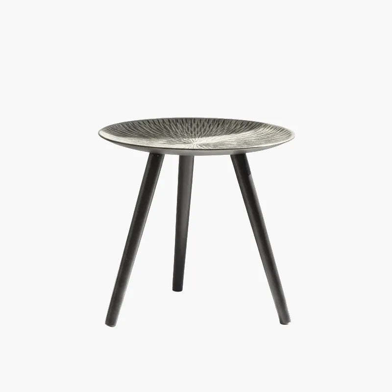 Spiked Texture Accent Table on a light grey background