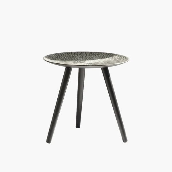 Spiked Texture Accent Table on a light grey background